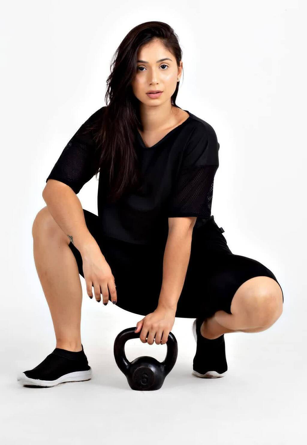 Bermuda com Bolso e Cropped Manga de Tela Conjunto Fitness